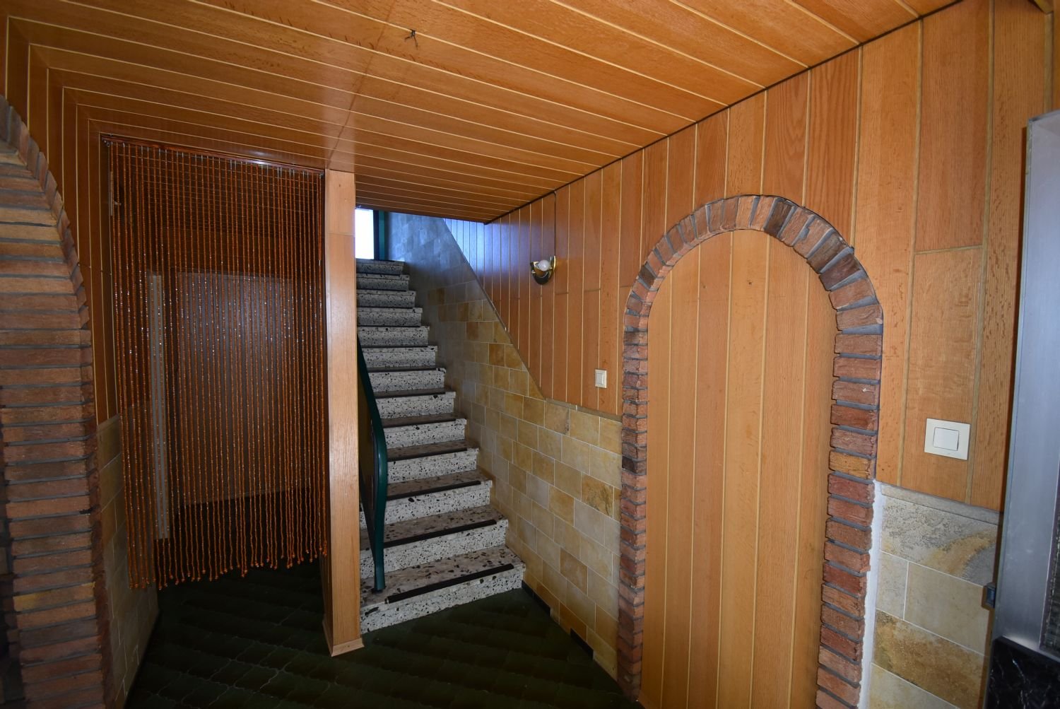 Treppe in das Obergeschoss